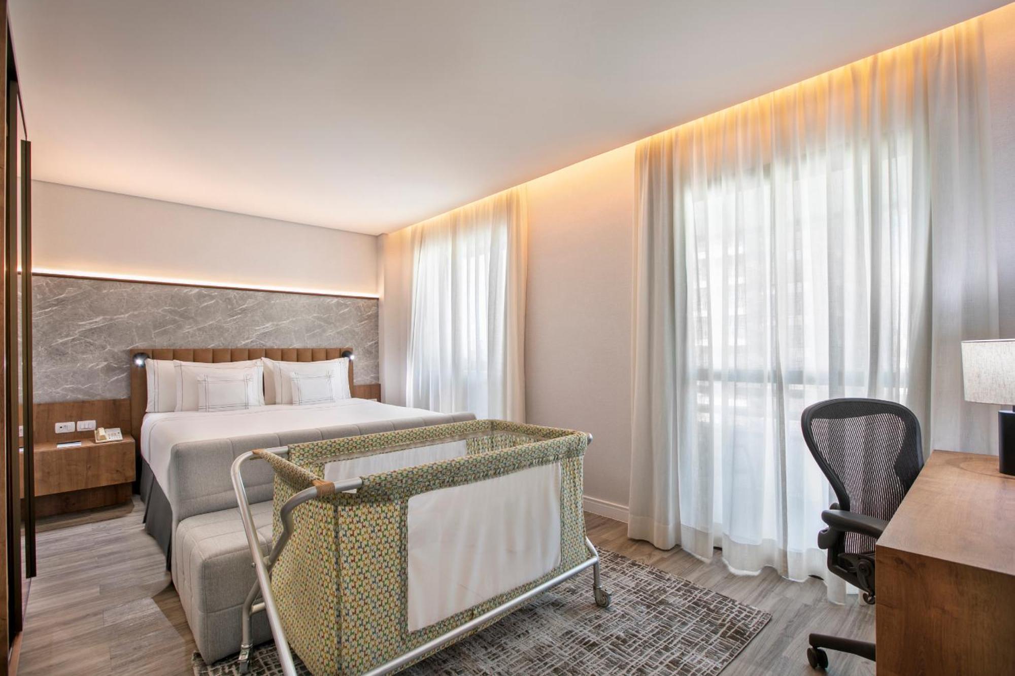 Melia Jardim Europa Hotel Sao Paulo Exterior foto A crib in a hotel room